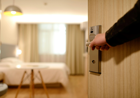 Photo by Pixabay: https://www.pexels.com/photo/person-holding-on-door-lever-inside-room-271639/